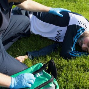 First Responder assessing an injured cricketer